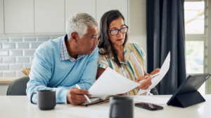 Senior reviewing a checklist before choosing a Medicare plan