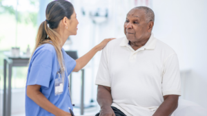Senior receiving a preventive health screening at a wellness visit.
